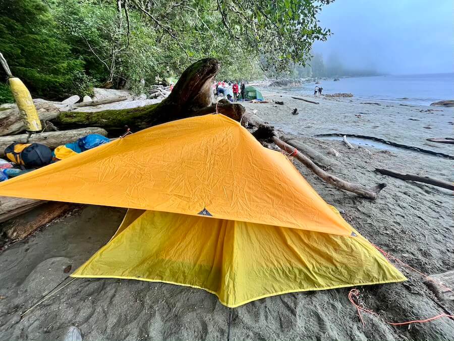 How to Keep Your Tent Dry in Rain: 10 Proven Ways + Images! 1 A tarp provides an extra layer of protection against the rain.
