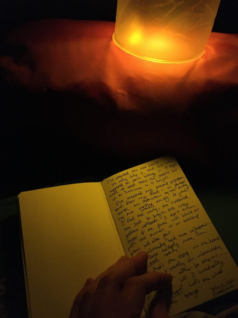 9 Fun Things to Do While Camping Alone 3 reading a book when camping
